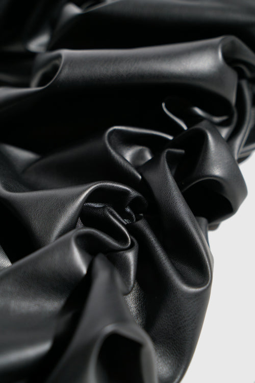 Metal Logo Pinched Comfortable Faux Lambskin Jeans